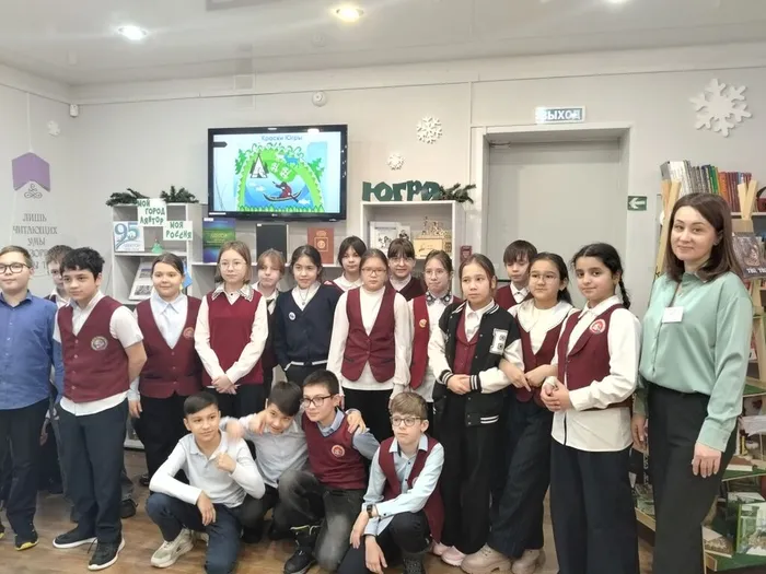 Обзор книжной выставки "Краски Югры" _ ученики ЛСОШ № 5